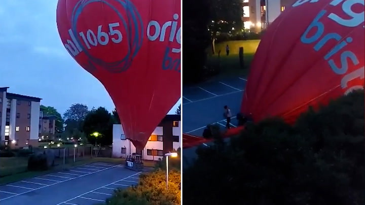 Hot air balloon lands in Somerset car park after narrowly missing houses