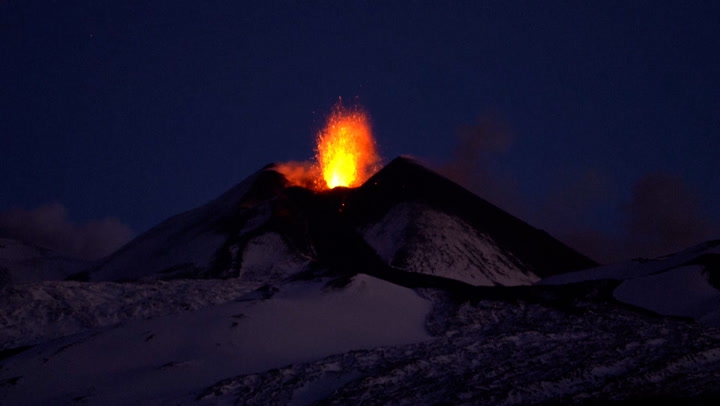 Stunning footage shows Mount Etna volcano eruption inside snow-capped crater