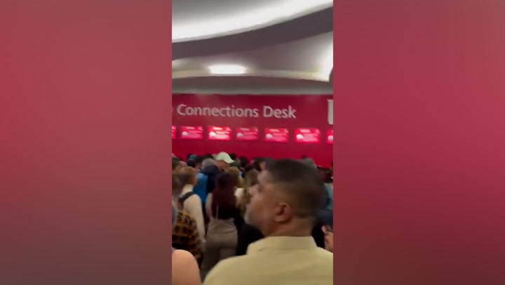 Long queues in Dubai airport as floods cause travel chaos