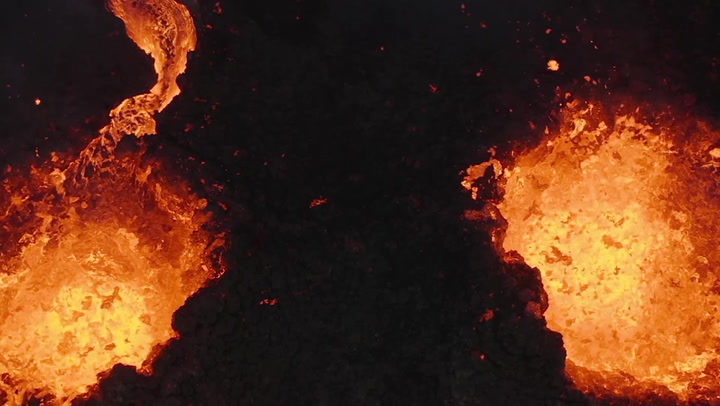 Erupting Iceland volcano spews lava in amazing drone footage