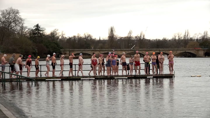 Swimmers compete in Christmas Day race at London's Hyde Park