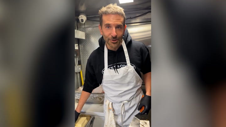 Bradley Cooper serves up Philly cheesesteaks from NYC food truck