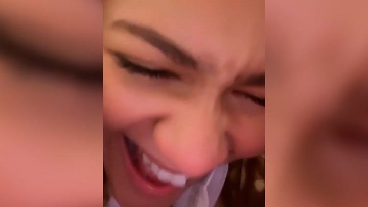 Zendaya laughs at herself after paparazzi catch her falling over