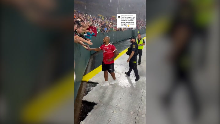 Police officer grabs NFL star AJ Dillon at Manchester City game