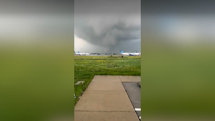 Tornado looms near Chicago airport during supercell storm