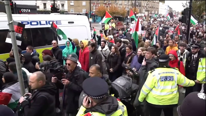 Pro-Palestinian protesters chant outside Keir Starmer's Camden office