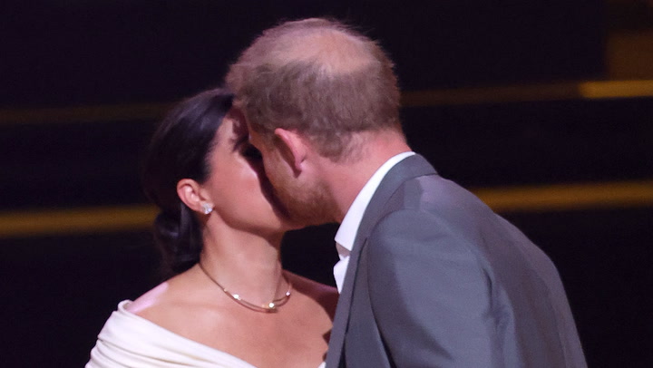 Prince Harry and Meghan Markle share romantic kiss on stage at Invictus  Games | Lifestyle | Independent TV