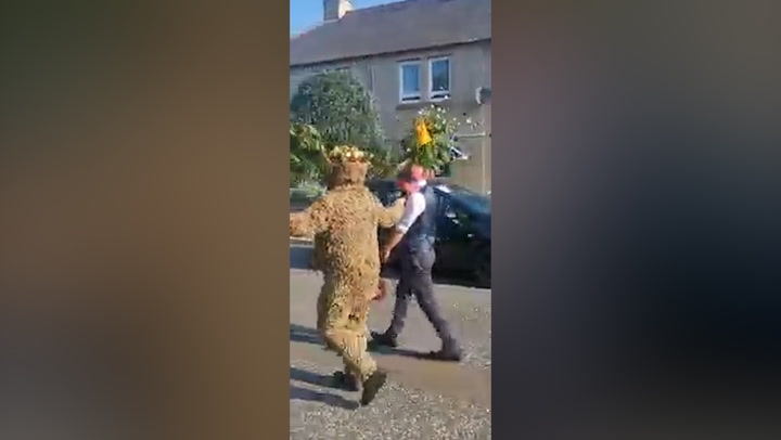 Man dresses head-to-toe in burrs to walk seven miles during Scottish tradition
