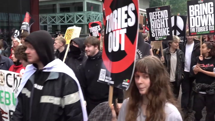 Protesters march through Manchester as Conservative Party annual conference begins
